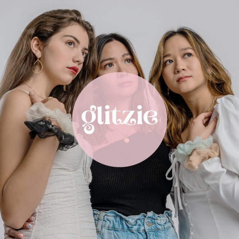 three-beautfiul-women-posing-for-fashion-photoshoot-glitzie-square